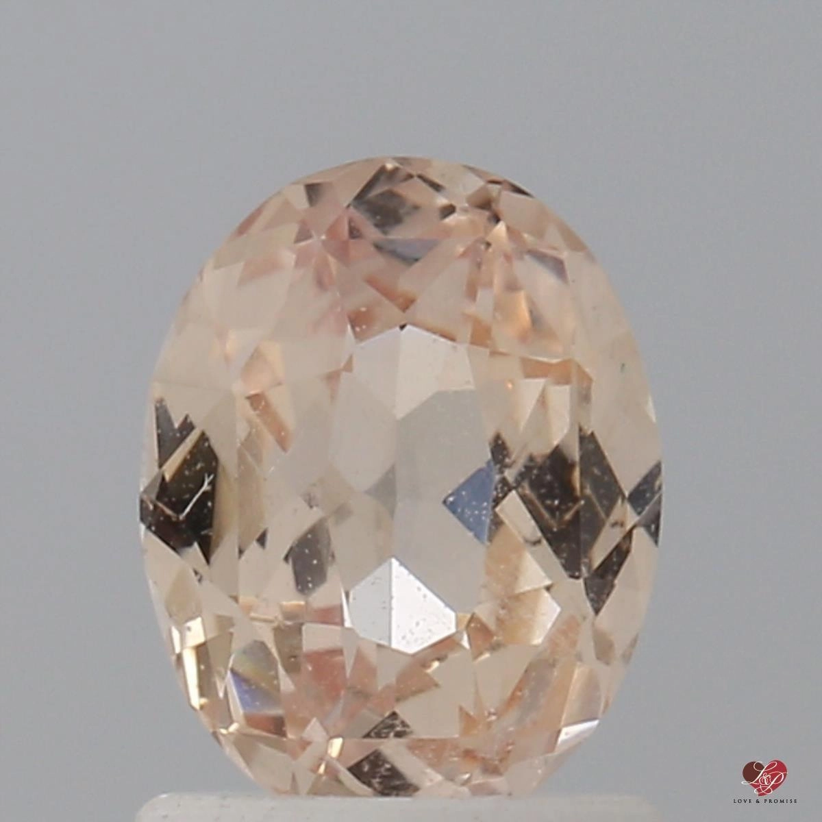 1.36cts Oval Light Peach Blush Champagne Sapphire